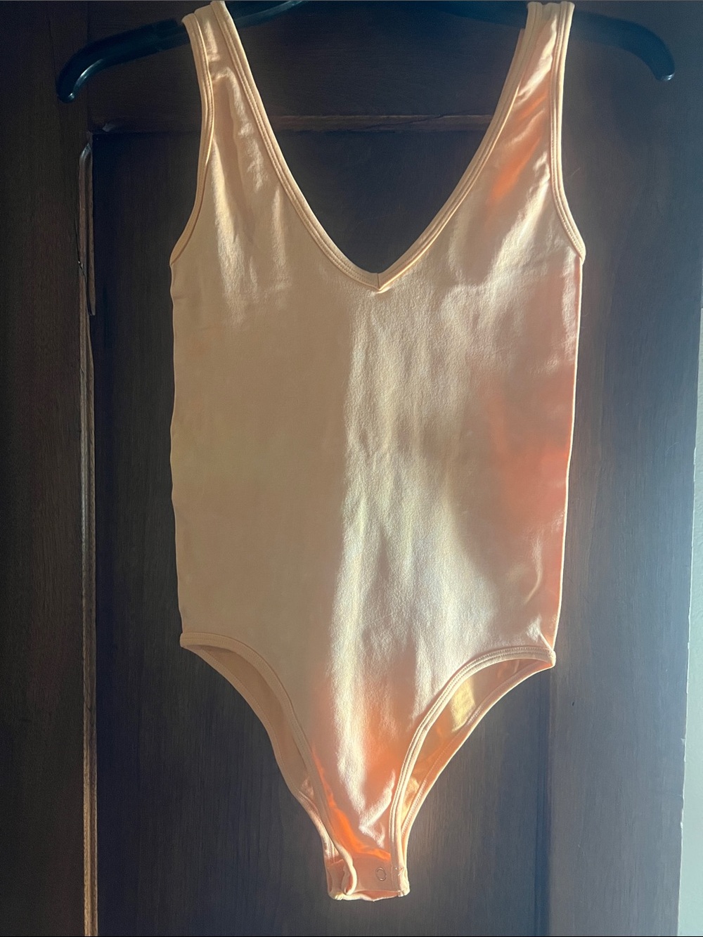 Women's V-Neck Sleeveless Bodysuit in Light Peach